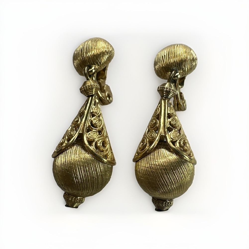 Vintage 1961 Monet BOLERO Clip On Earrings Gold Tone Textured Dangle Book Piece